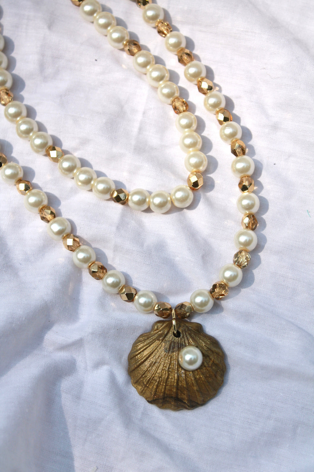 Gold and Pearl beaded Necklace with Gold Seashell